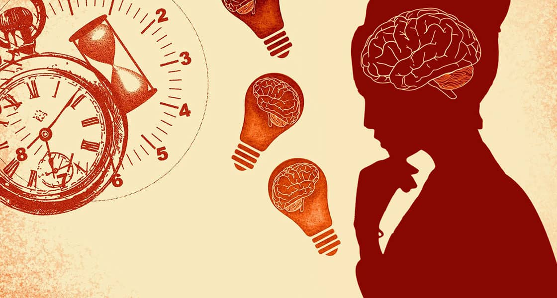 Different kind of clocks together with lightbulb with brain inside