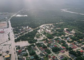 Aerial flood view covering large amount of land
